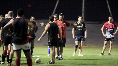 Roelof Kotze, in red, has stressed that the players need to come to the field and train where he can see them, before he picks them. Photo by Sarah Dea / The National