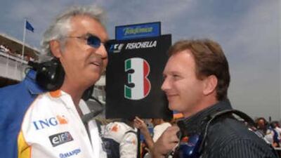 Christian Horner, right, the team principal of Red Bull Racing chats on the grid to his Renault rival Flavio Briatore before the Spanish Grand Prix earlier this year.