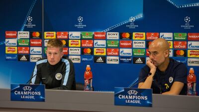 Pep Guardiola and Kevin De Bruyne speak to the media ahead of the Uefa Champions League quarter-final first leg between Manchester City and Liverpool. Peter Powell / EPA