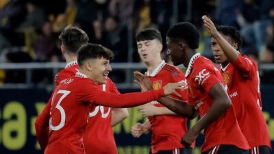 Manchester United's Kobbie Mainoo celebrates scoring the second goal with teammates. Reuters