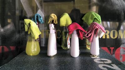 Camp Star Gym in Dubai International City is providing their customers with masks, gloves, and sanitising spray bottles to clean equipment before and after use. Reem Mohammed / The National