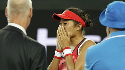 China's Zhang Shuai cries after winning her first round match against Romania's Simona Halep at the Australian Open tennis tournament at Melbourne Park, Australia, January 19, 2016. REUTERS/Jason Reed