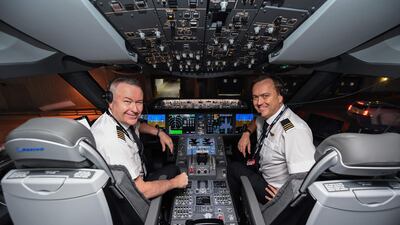 Sean Golding and first officer Jeremy Sutherland in the cockpit of the Dreamliner. AFP