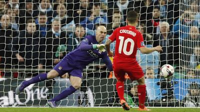 Liverpool's Philippe Coutinho has his penalty saved by Manchester City's Willy Caballero during the penalty shootout. Reuters / John Sibley
