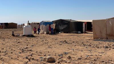 A Syrian refugee encampment near Umm Jimal in north-eastern Jordan, where the refugees sometimes find seasonal employment picking olives. Khaled Yacoub Oweis / The National