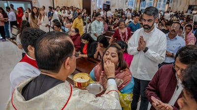 Worshippers at St Michael’s Catholic Church in Sharjah. While mindful of the challenges facing the Emirates, churchgoers in Abu Dhabi were grateful for the opportunity to come together to deliver a message of hope. Ahmed Ramzan / The National