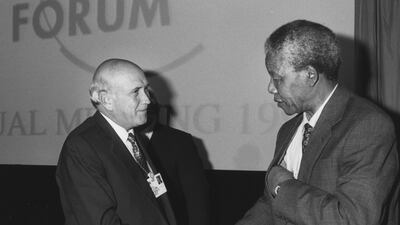 Former South African president FW de Klerk shakes hands with South African anti-apartheid leader Nelson Mandela in Davos in 1992. World Economic Forum