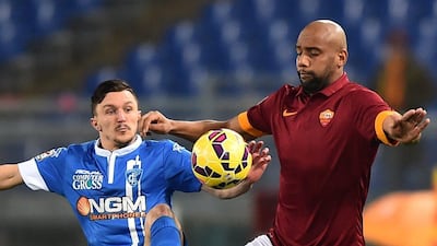 AS Roma's Maicon vies with Empoli's Marinho on Saturday during their Serie A 1-1 draw. Gabriel Bouys / AFP / January 31, 2015