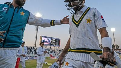 Pakistan's Babar Azam walks back to the pavilion after scoring 143 at the end of the second day of the first Test against Bangladesh at the Rawalpindi Cricket Stadium in February. AFP