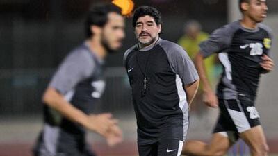 At 11.14 pm Saturday, Diego Maradona, centre, the Argentine football great, began the Al Wasl chapter of his football life.