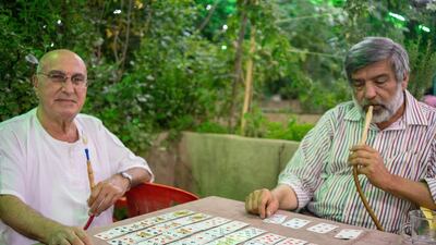 Locals gather for cards, coffee and shisha in Tal Olya, one of the city's oldest cafes after iftar