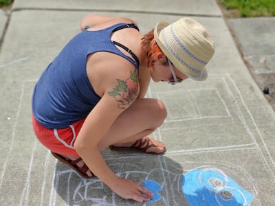 Casey Drake creates chalk drawings of childhood characters on the sidewalk of her residential neighbourhood in Orlando, Florida. Courtesy Casey Drake