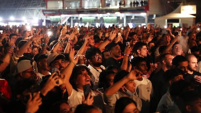 People enjoying the performance of DJ Martin Garrix during the F1 concert held at Etihad Park in Abu Dhabi. Pawan Singh/The National