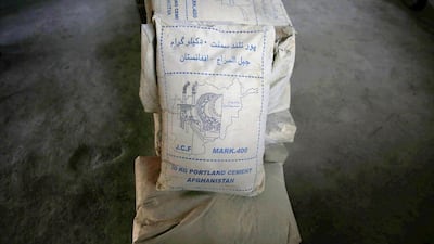 Sacks of cement sit ready for delivery.