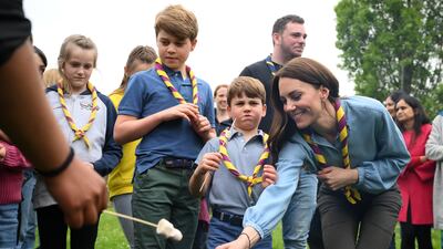 Coronation celebrations continued with a bank holiday on Monday. Prince George, Prince Louis and Catherine, Princess of Wales, toast marshmallows and volunteer in Slough. PA