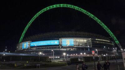 Wembley Stadium’s arch is illuminated in green, in London, in tribute to Chapecoense. Will Oliver / EPA