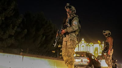 Taliban security check a vehicle at a checkpoint in Kabul, Afghanistan, on February 26. EPA