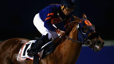 Joel Rosario riding Mind Your Biscuits wins the Dubai Golden Shaheen. Francois Nel / Getty Images