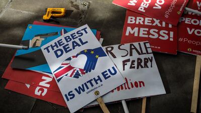 Anti-Brexit placards lie outside the House of Parliament. Getty