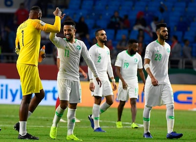 Saudi Arabia goalkeeper Mohammed Al Owais and midfielder Hatan Bahbri celebrate. AFP