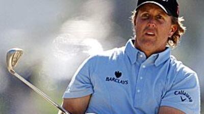 Phil Mickelson uses a Ping-Eye 2 wedge at Torrey Pines Golf Course, San Diego, on Saturday.