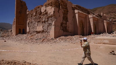 A man walks near Tinmel Mosque, which was damaged by the deadly earthquake, in Tinmel, Morocco. Reuters