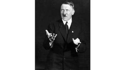 Adolf Hitler strikes a variety of poses after his release from prison in 1924. Heinrich Hoffmann / Getty Images