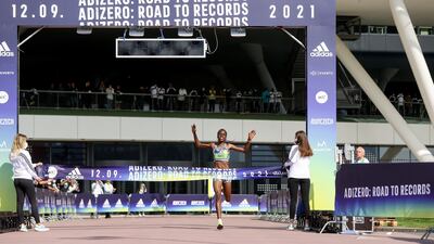 Agnes Tirop of Kenya wins the ADIZERO: ROAD TO RECORDS Women's 10km. Getty Images