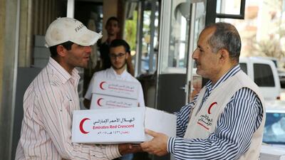 The Khalifa Foundation and the UAE Red Crescent Authority (RCA) distribute food aid to families in Sidon, South Lebanon.