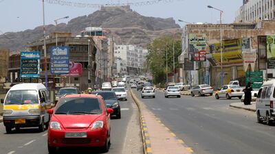 Yemenis drive down a street in Aden's Mualla region. AFP
