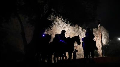 Israeli border police stand guard during clashes between Palestinians and the Jewish extremist group Lahava just outside Jerusalem's Old City on April 22, 2021. AP Photo