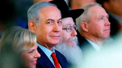 Israeli Prime Minister Benjamin Netanyahu and his wife, Sara, attend an inauguration ceremony for a new emergency room at the Barzilai Hospital in Ashkelon on February 20, 2018. Jack Guez / AFP