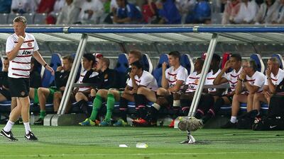 David Moyes watches from the touchline during the pre-season friendly game in Japan against Yokohama F. Marinos in July 2013. Getty