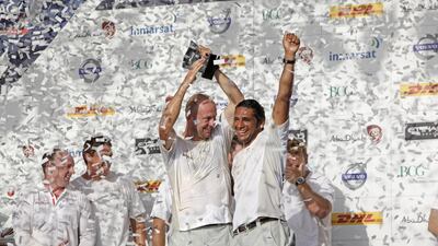 January 13 2012 - Abu Dhabi - Ali Khalid and Azzam skipper Ian Walker celebrate their victory at the Etihad In-Port Race. (Razan Alzayani / The National)