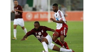 Subait Khater, right, and Al Jazira have laid low the rest of the league. After beating Al Wahda 4-0 Monday night to win the President's Cup, first-place Jazira need the Pro League title to take the double.