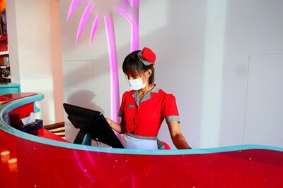 Waitresses wear old-school uniforms. Pawan Singh / The National