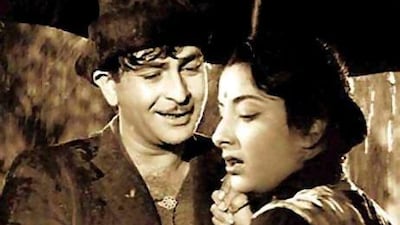 A still from the movie Shree 420, directed, produced by and starring Raj Kapoor, with co-star Nargis. Courtesy YouTube