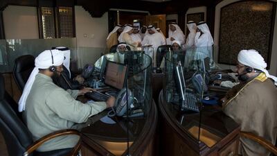 Members of the Federal National Council tour the call centre at the General Authority for Islamic Affairs and Endowment in Abu Dhabi on February 24, 2014. Christopher Pike / The National