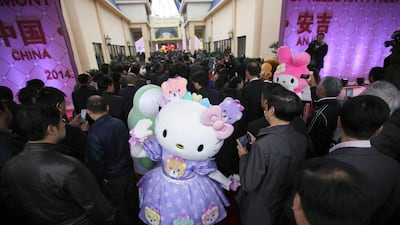 Sanrio characters greet guests during the inauguration ceremony of the Hello Kitty amusement park in Anji, Zhejiang province. Carlos Barria / Reuters