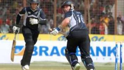New Zealand's Ross Taylor, left, and Jamie How run Between the wickets during the third one-day international against Bangladesh today.