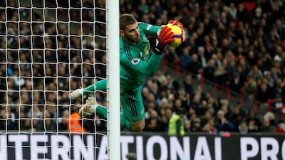 Manchester United's David de Gea makes a save from Kane. Action Images via Reuters