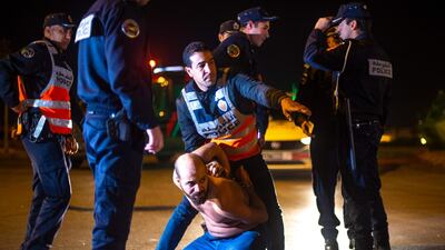 Moroccan police arrest a man who refuses to follow confinement measures in place as part of a state of emergency to combat the spread of coronavirus, Casablanca. AFP