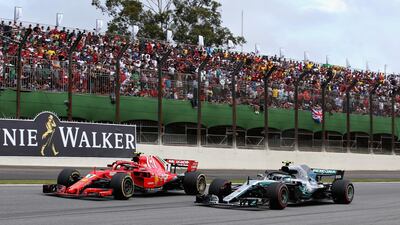 Kimi Raikkonen and Valtteri Bottas fight for third place. Getty Images