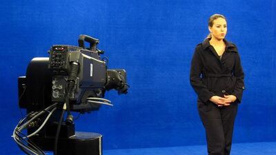Nadia Soussi, a journalist and presenter at Morocco's new Tamazight-language TV channel, practicing a newscast in the studio in Rabat, the Moroccan capital.
