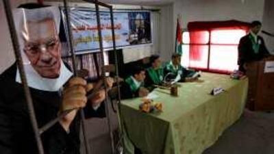 In Rafah, Palestinian children hold a mock trial of Mahmoud Abbas over his initial failure to press for the adoption of the Goldstone report.