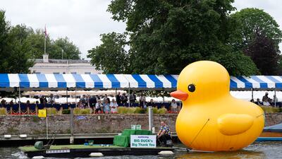 A large inflatable rubber duck is towed along the river Thames on the opening day of the 2024 Henley Royal Regatta. PA