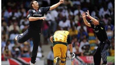 England's Michael Yardy jumps to field a high throw as Australia's David Hussey takes a run during yesterday's final.