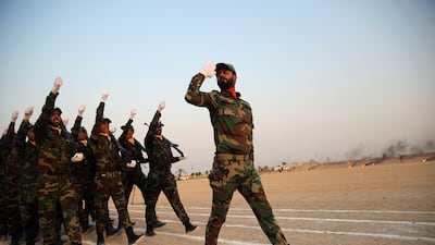 Members of the paramilitary Popular Mobilisation Forces in Karbala, Iraq, in 2019. Reuters