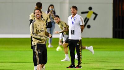 Real Madrid's Spanish defender Sergio Ramos laughs during a training session. AFP