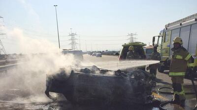 Police said the Emirati’s vehicle rolled four times and then caught on fire after colliding with another vehicle on Sheikh Mohammed bin Zayed Road in Ajman. Courtesy Ajman Police.
